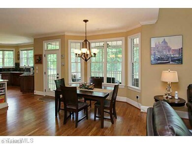 Breakfast. Sit down for dinner?  The bay window adds a pretty architectural feature to the breakfast room.