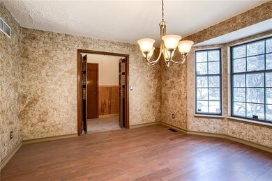 Formal living room offers ample space for home off