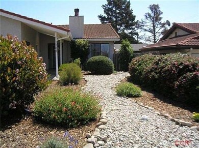Front right Side of the house showing the rock and