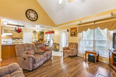 FLOWING OPEN FLOOR PLAN. LIVING, KITCHEN AND BREAK