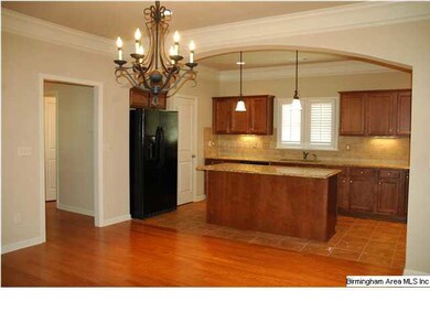 Large open kitchen with granite counters.