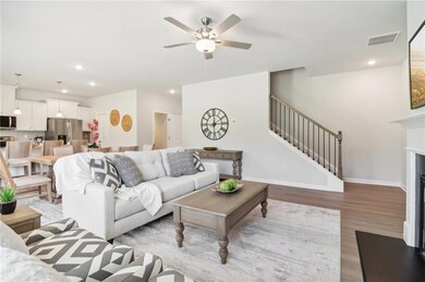 Living room with hardwood / wood-style floors and 