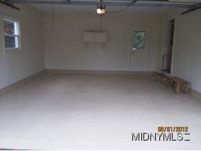 Includes a 2 Stall Garage