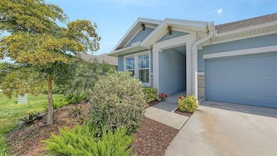 Covered front entry, upgraded landscaping