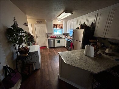 Kitchen featuring appliances with stainless steel