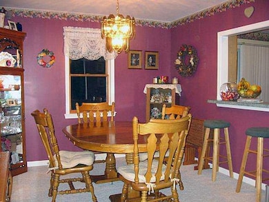 Dining Room. The dining room is open to the living