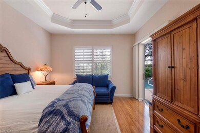 Master bedroom with wood floors