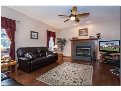 Spacious family room/hardwood floors/lovely firepl