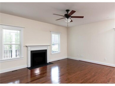 Beautiful Gas Fireplace anchors this large (17'10