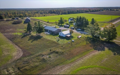 7557 Loop Rd, Posen, MI 49776 - photo 2