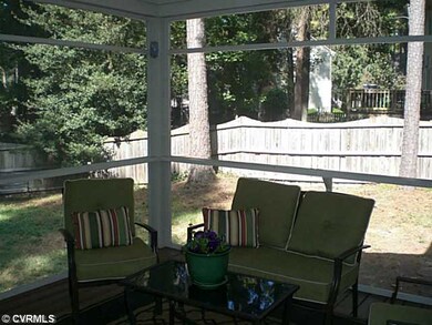 Porch - Screened porch with ceiling fan.