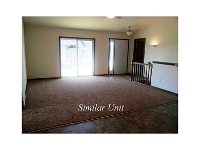 Living Room-L1. Picture is of Similar Unit.
