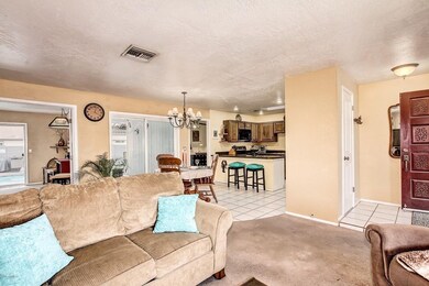 Family room with view of kitchen