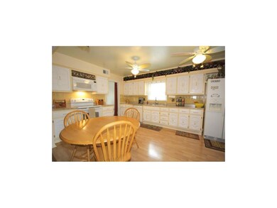 Spacious Kitceh with lots of cabinets and counters