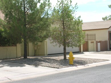 front of house with fire hydrant in yard