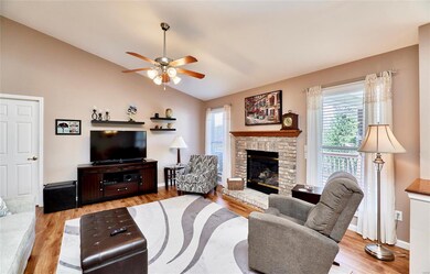Vaulted ceiling, ceiling fan & Gas fireplace in th