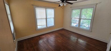 Spare room featuring plenty of natural light, a c