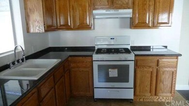 Front unit kitchen with granite tops.