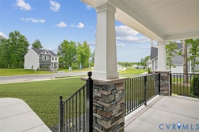 Covered porch with a lawn and a residential view