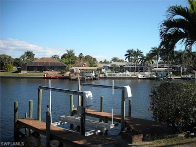 Wrap around boat dock with lift and there is also a concrete cantilever dock...