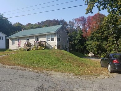 Up Hill Front and Driveway