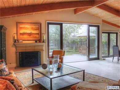 Great room style living room with gas fireplace.