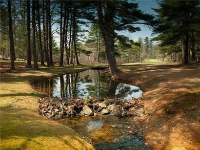 Yard/Garden. A babbling brook runs...