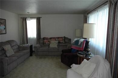 Large living room accommodates two large couches a