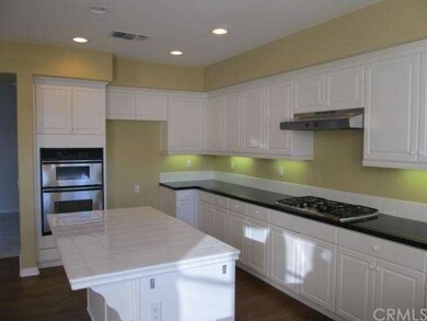 Black stone counters accentuate the white, making 