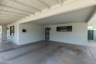 Carport with security door
