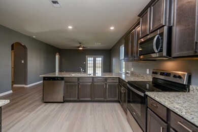 This kitchen is HUGE! Look at all of the counter space! Entertainer's delight!