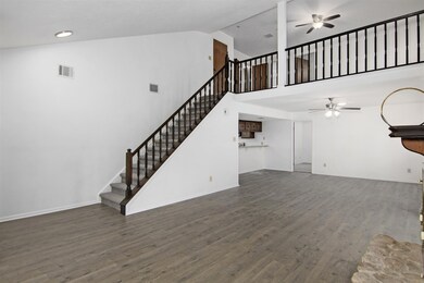 The primary bedroom is downstairs. Two secondary b