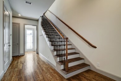 Oversized entry with 2 closets and door to the small back deck.