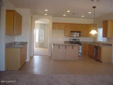 KITCHEN OPEN TO FAMILY ROOM