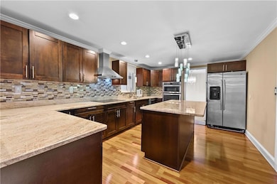 Kitchen with appliances with stainless steel finis