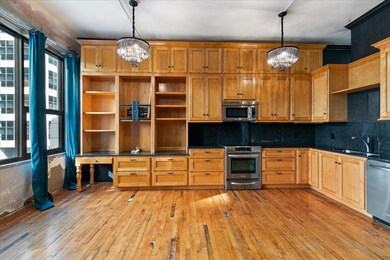Plenty of storage and built-in desk. Granite count