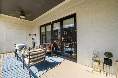 The modern doors open allowing you to enjoy outdoo