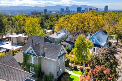 View of urban area with a mountainous background and nearby suburban area