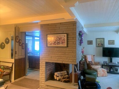 Enjoy the gas Fireplace in both the Dining Room an