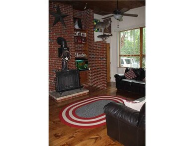 Living Room. Functioning wood burner and chimney. 