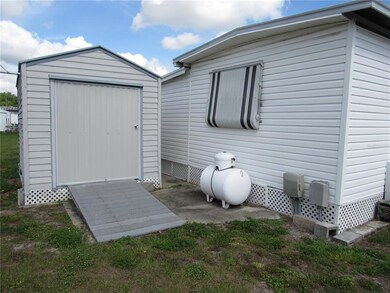 Free standing golf cart shed