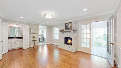 Family Room w/wet bar and access to Sunroom