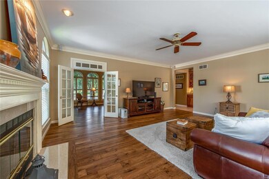 Family Room o has Beautiful Glass French Doors Exp