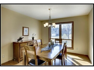 Formal dining room with hardwood floors and new li