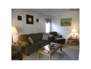 Much natural light in the living room.  Nice floor