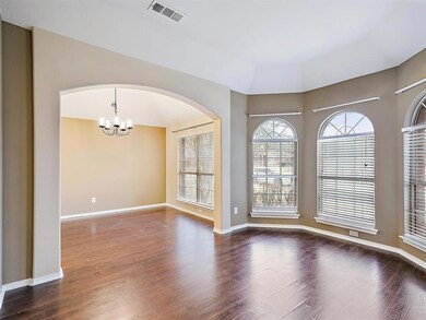 Front Living area is open to formal dining room.