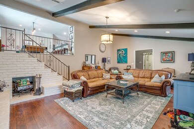 Living room with recessed lighting, stairway, and hardwood / wood-style flooring