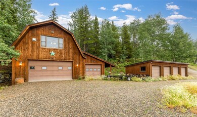 3-car garage/studio & storage building