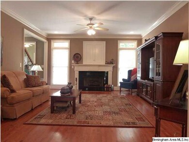 Oversized Living Room with gorgeous hardwood floor