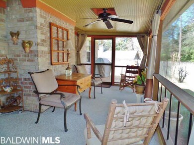 Screened back porch with bead board ceiling and dr